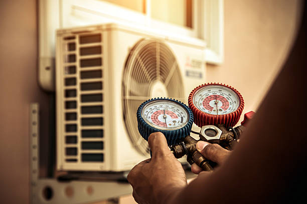 Professional Heat Pump Repair technician working in Melbourne, IA